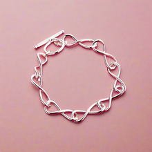 Load image into Gallery viewer, Twisted Infinity Bracelet
