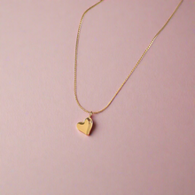 Load image into Gallery viewer, Sideways Dangling Heart Necklace