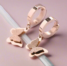 Load image into Gallery viewer, Dangling Frosted Butterfly Huggie Earrings