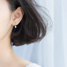 Load image into Gallery viewer, Small Dangling Huggie Heart Hoops