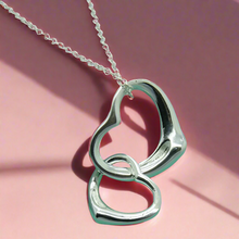 Load image into Gallery viewer, Double Dangling Hollow Hearts Necklace
