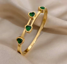 Load image into Gallery viewer, Four Heart Bangle Bracelet
