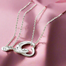 Load image into Gallery viewer, Double Dangling Hollow Hearts Necklace
