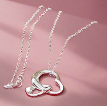 Load image into Gallery viewer, Double Dangling Hollow Hearts Necklace
