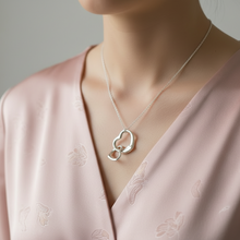 Load image into Gallery viewer, Double Dangling Hollow Hearts Necklace
