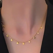 Load and play video in Gallery viewer, Mini Dangling Butterfly Necklace
