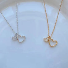 Load image into Gallery viewer, Hollow Heart &amp; Mini Zircon Heart Necklace
